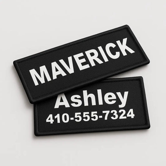 Two black patches with white text on a light gray background